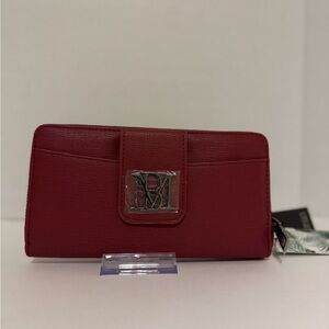 NWT long front sano pocket and full zip 12 card slots and space for cash